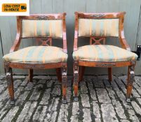 A pair of French Empire style salon chairs with ormolu mounts. H. 87cm.