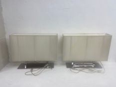 A pair of contemporary Axolight 'Clavius' table lamps each with square chrome base and white
