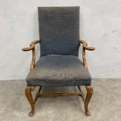 A Georgian oak framed open armchair on carved stretchered cabriole supports. H.100 (Seat height