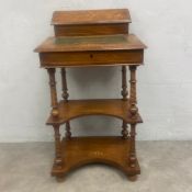 A C.1900 walnut Davenport with superstructural compartment over the gilt and tooled green leather