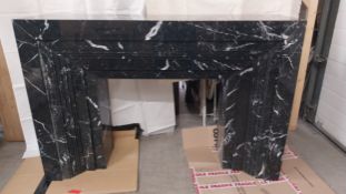 A contemporary Art Deco style stepped black marble fire surround. H.100 W.150 D.40cm
