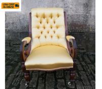 A 19th century mahogany framed armchair in deep buttoned satin upholstery. Seat height 41cm.
