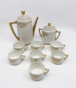 An early 20th century Art Deco style Limoges china part coffee service to include coffee and sugar
