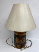 A 19th century hand painted and gilt tea canister table lamp bearing the Royal Coat of Arms of the