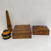 A mixed lot to include a vintage walnut obelisk together with two boxes with pyrography decoration