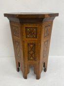 A 19th century parquetry inlaid Damascene coffee or occasional table of octagonal form raised on