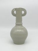 A Chinese Song or Yuan Dynasty style twin-handled porcelain bottle vase with pale celadon glaze