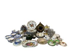 A large mixed collection of Continental and other porcelain to include two putti crested mirrors, an