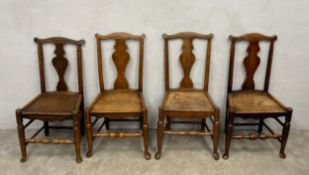 A collection of four Georgian country elm dining chairs with shaped splat backs above panel seats.