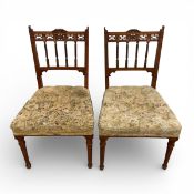 A pair of late 19th century walnut Aesthetic movement bedroom chairs. H.77cm.