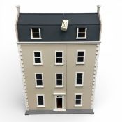 A large contemporary Georgian style doll's house with electric lighting. H.125 W.87 D.36cm.