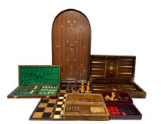 A mixed lot of board games to include chess and backgammon sets together with an early 20th