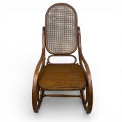A 19th century Thonet style bentwood rocking armchair. (With replacement seat). H.96 W.50cm.
