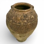 A large Mediterranean weathered terracotta olive jar or pithos. H.80cm.