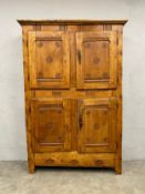 An 18th or 19th century French country pantry or kitchen food cupboard with carved panel doors. H.