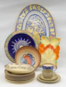 A mixed lot to include a large Italian majolica platter, a 1930s Clarice Cliff 'Autumn' platter, a