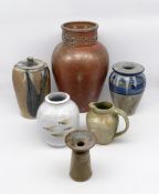 A mixed collection of studio pottery ceramics to include a glazed earthenware jug by Grace Birkett
