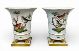 A pair of 20th century hand painted Rothschild Bird pattern Herend porcelain urn vases raised on