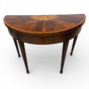 A Georgian flame mahogany segment veneered foldover top card table with satinwood, boxwood and