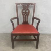 A 19th century mahogany Chippendale style dining armchair with shaped back and carved openwork splat