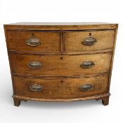 A small Georgian mahogany and satinwood crossbanded bowfronted chest of two short above two long