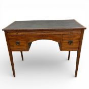 A 19th century mahogany desk or writing table with black leather top over brushing slide and three
