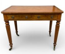 A George IV mahogany writing table in the Gillows manner with gilt and tooled tan leather inset