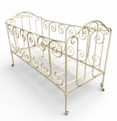 A C.1900 French wrought iron folding cot bed with painted finish. H.88 W.131 D.62cm