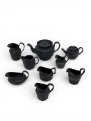 A mixed collection of possibly 18th century and later Wedgwood and other black basalt ceramics to