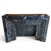 A contemporary Art Deco style stepped black marble fire surround. H.100 W.150 D.40cm