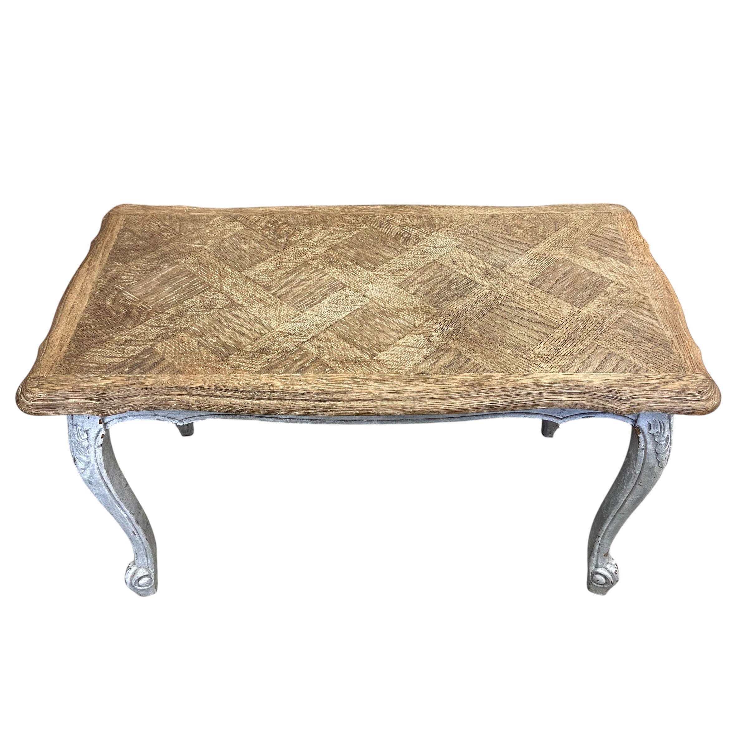 A vintage French farmhouse style coffee table with quatrefoil parquetry top raised on carved, - Image 2 of 4