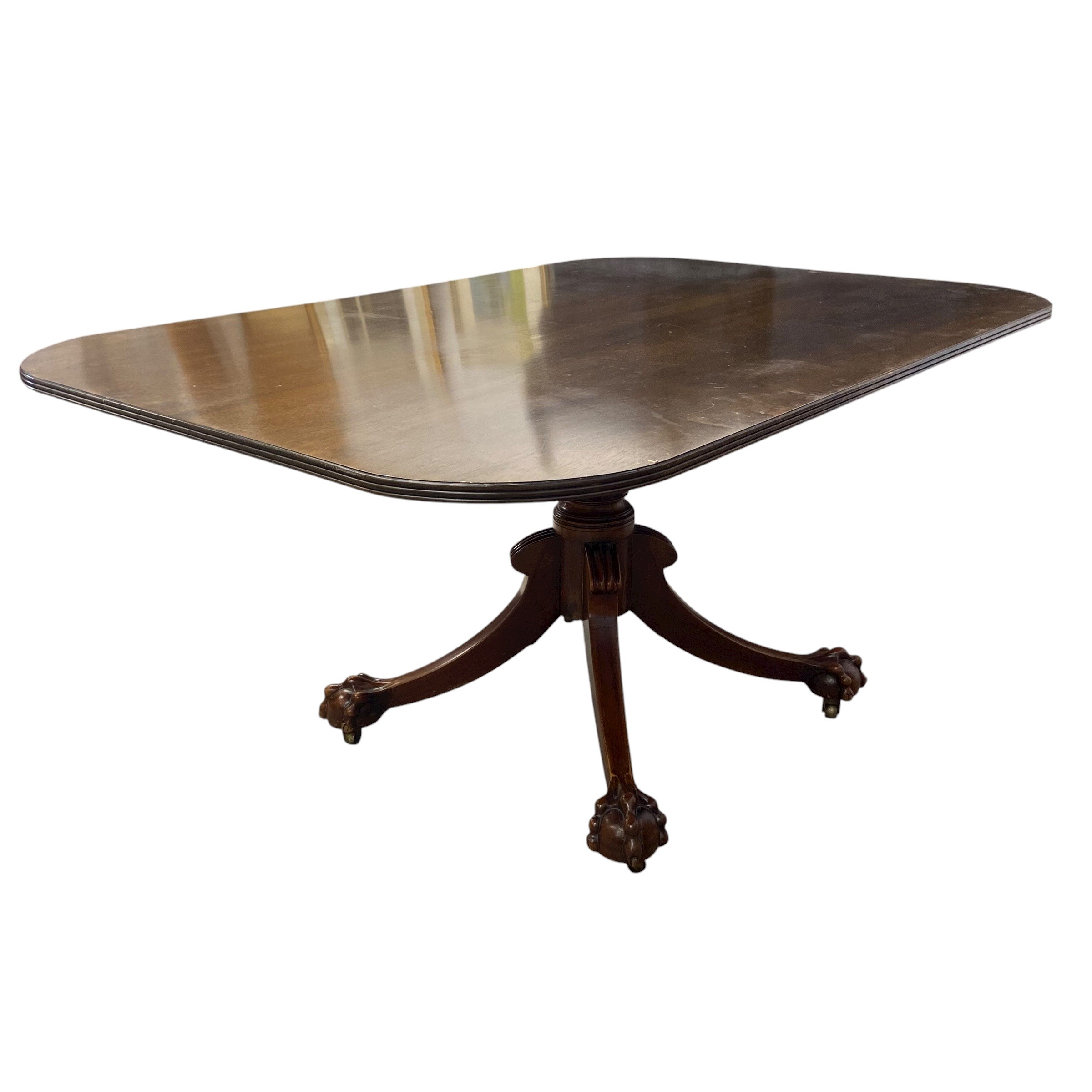A 19th century mahogany dining table with shaped top over the turned pedestal raised on splayed - Image 5 of 5