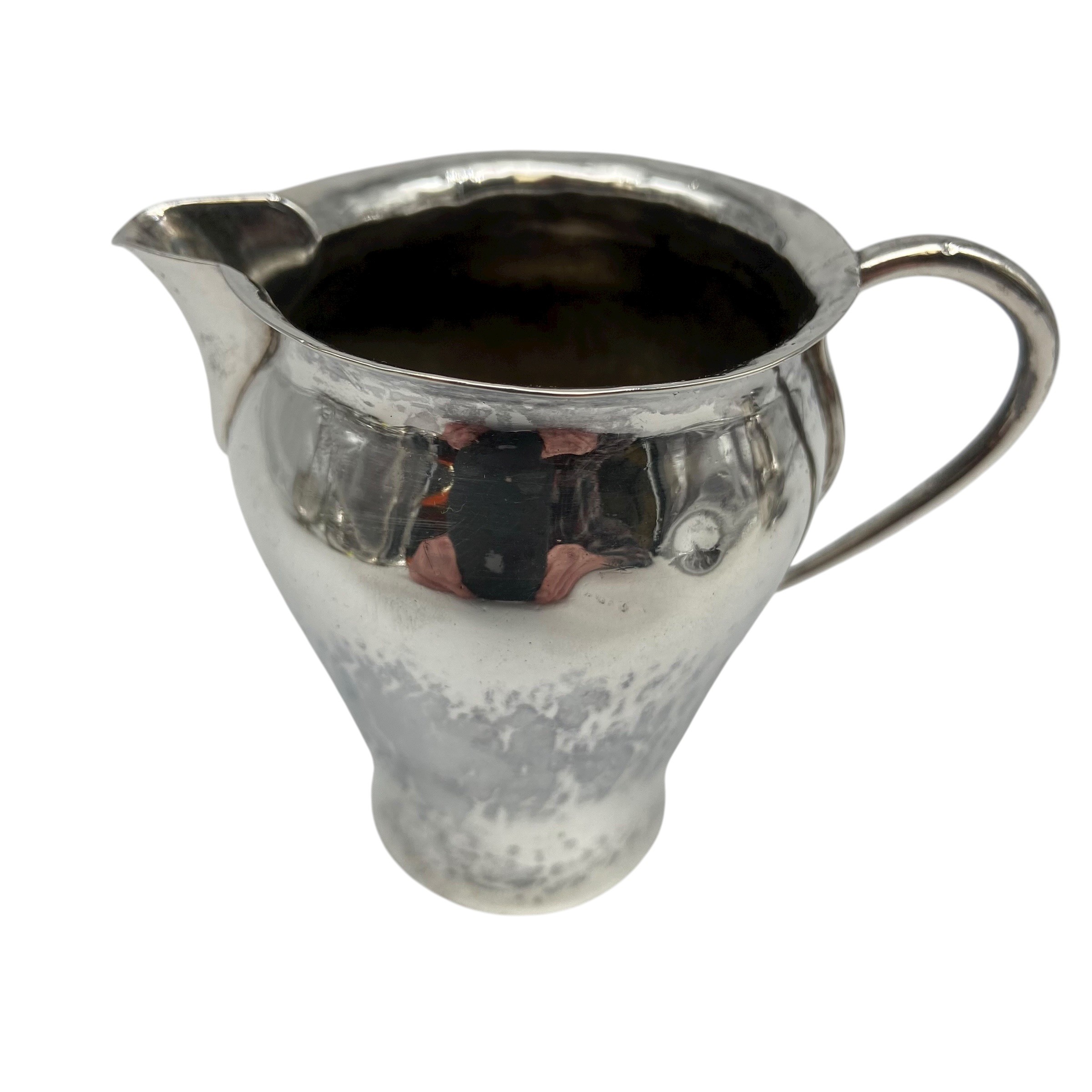 An Arts & Crafts hammered sterling silver creamer by Birmingham Guild of Handicraft Ltd, 1903 - Image 2 of 10
