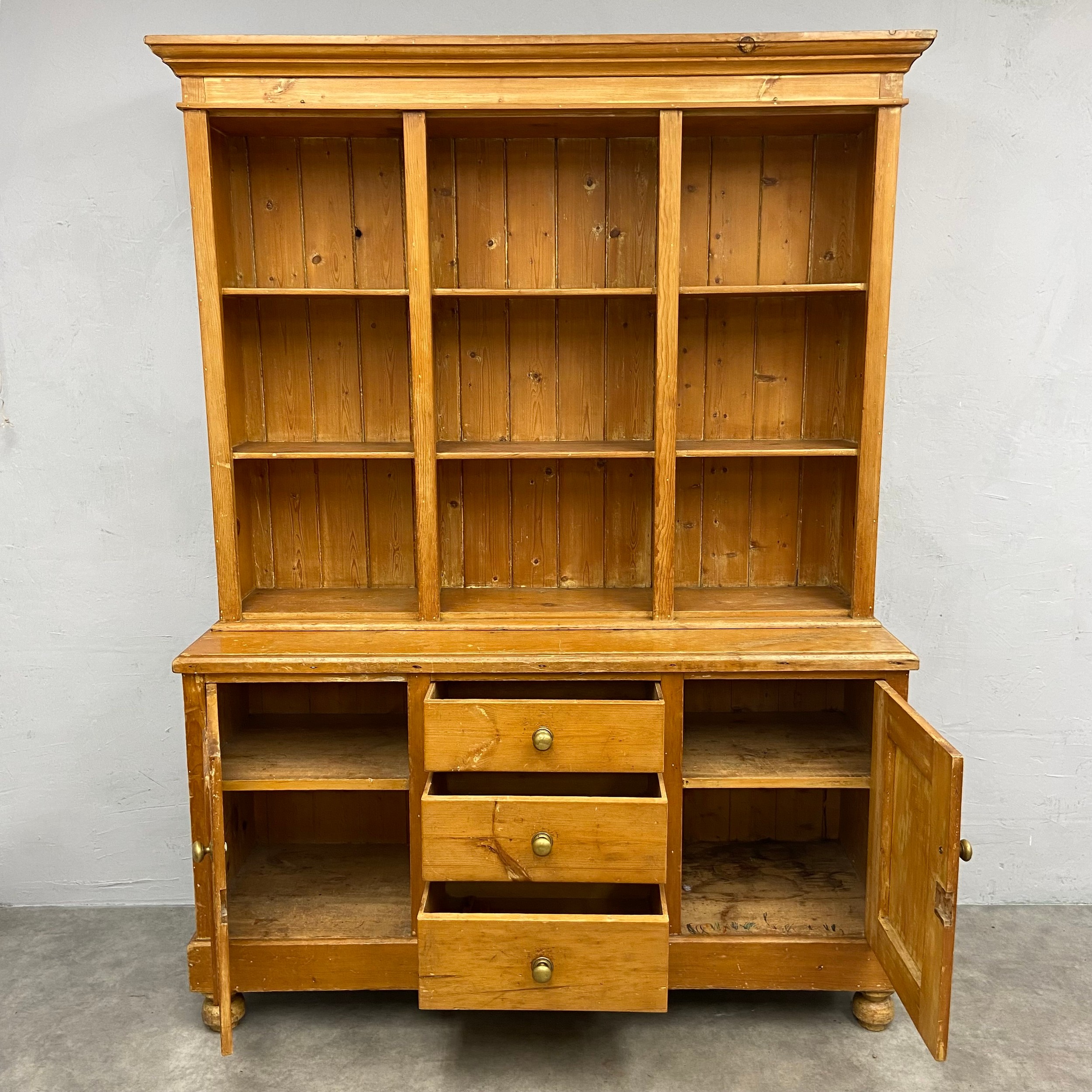 A C.1900 pine dresser in two parts with three shelves over base cabinets and drawers raised on bun - Image 2 of 5