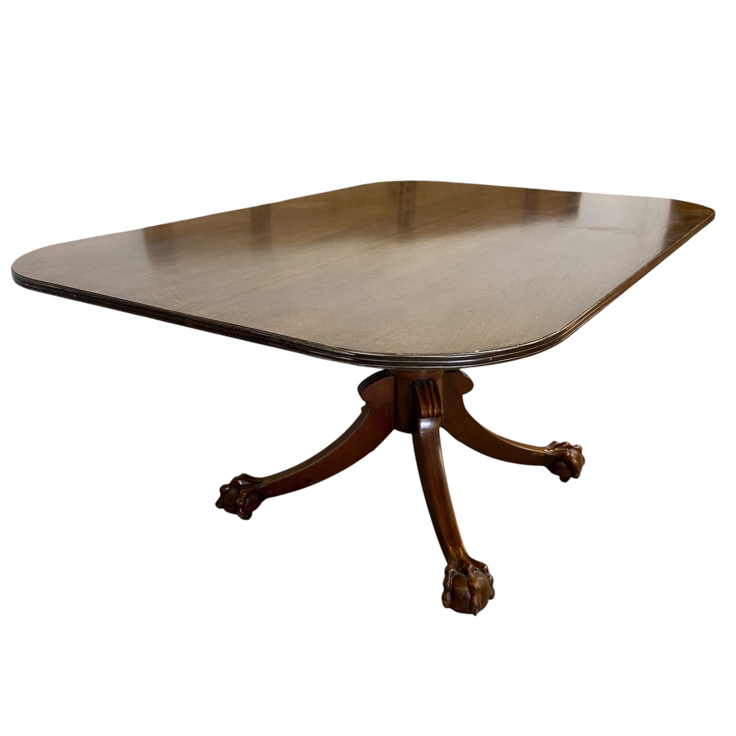 A 19th century mahogany dining table with shaped top over the turned pedestal raised on splayed - Image 4 of 5