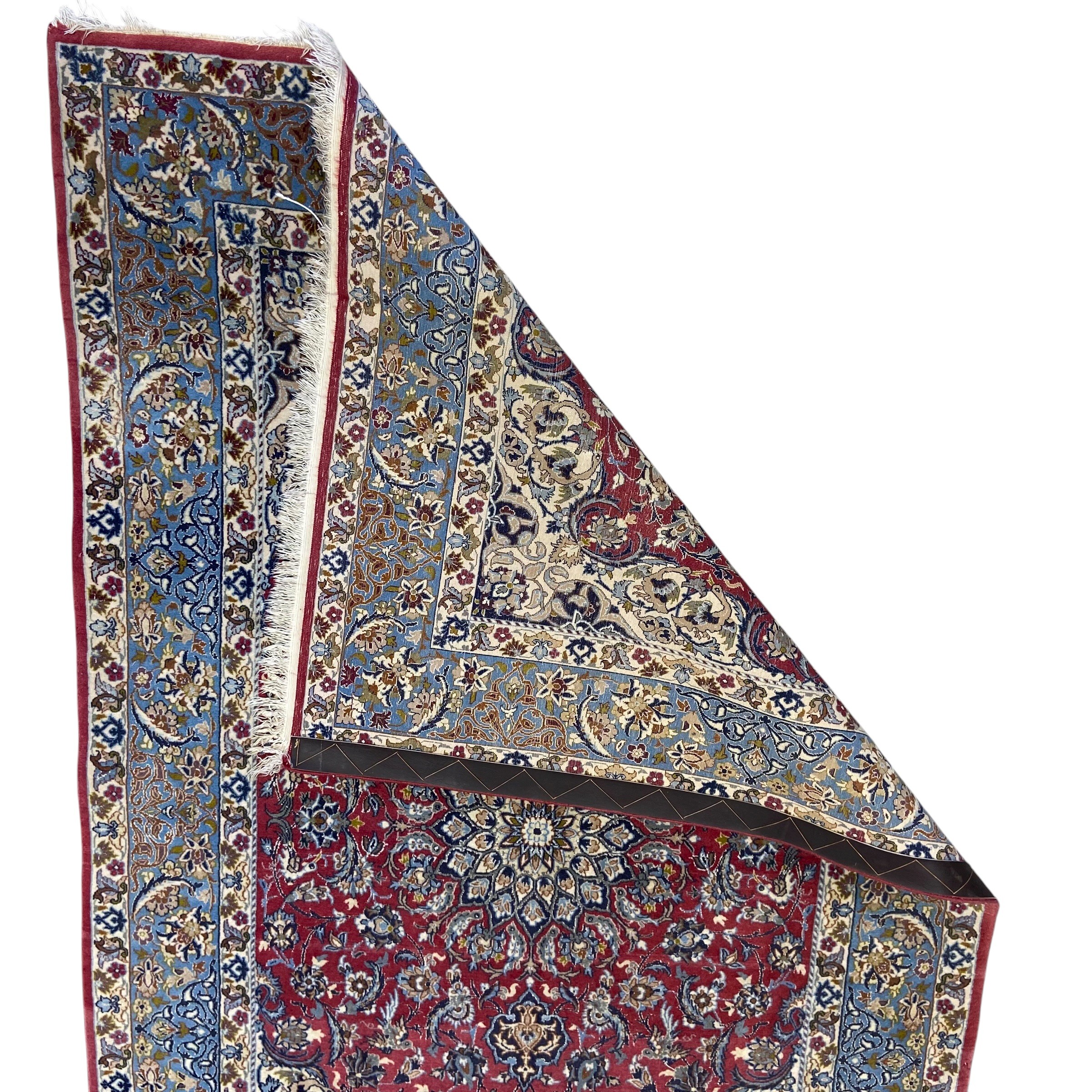 A Persian Najafabad rug with central flowerhead medallion in the polychrome field over a burgundy - Image 3 of 3