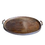 A 19th century oak drinks tray with moulded surround and shaped handles. 62x44cm.