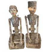 A pair of 20th century hand carved, painted and distressed Javanese matrimonial Loro Blonyo or