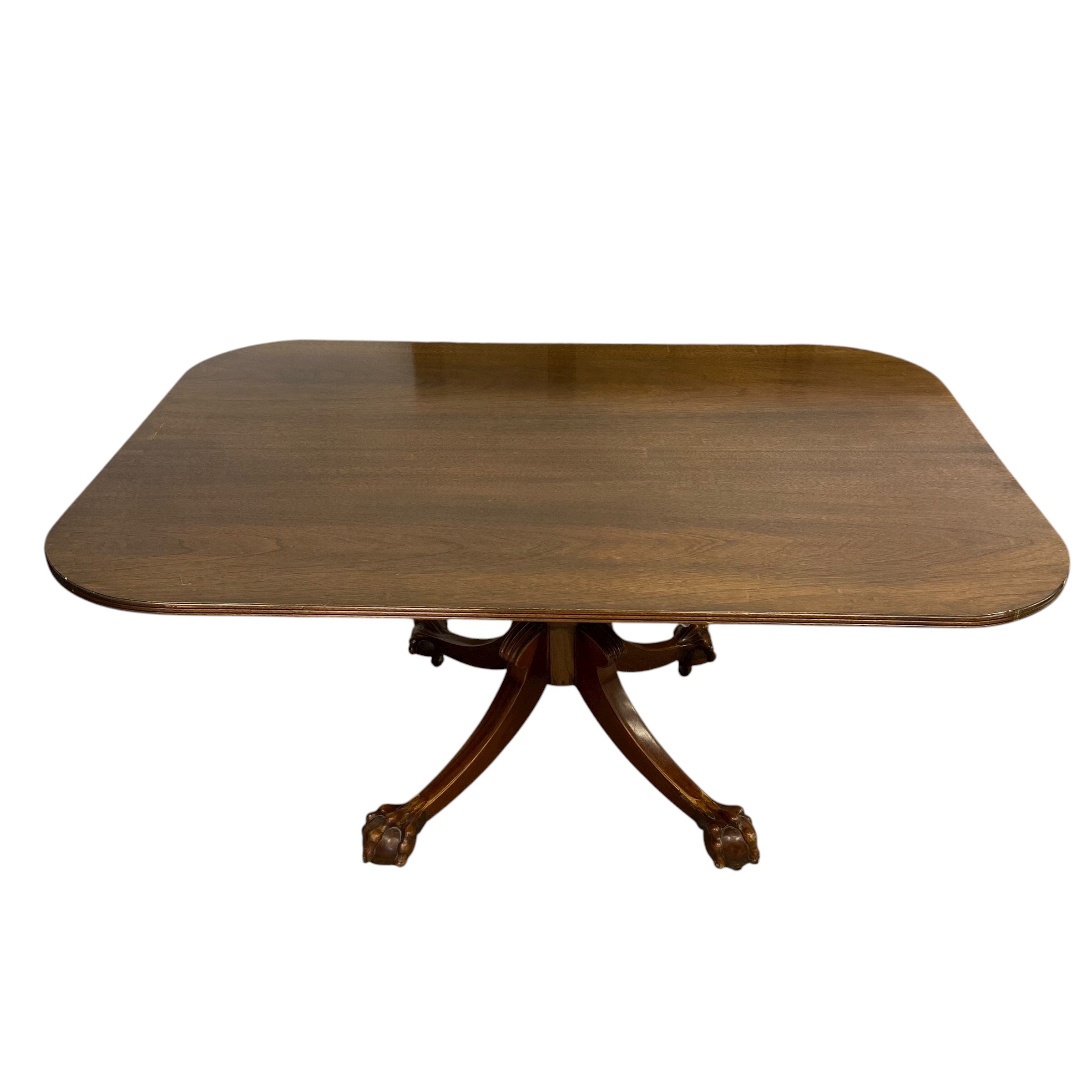A 19th century mahogany dining table with shaped top over the turned pedestal raised on splayed - Image 2 of 5
