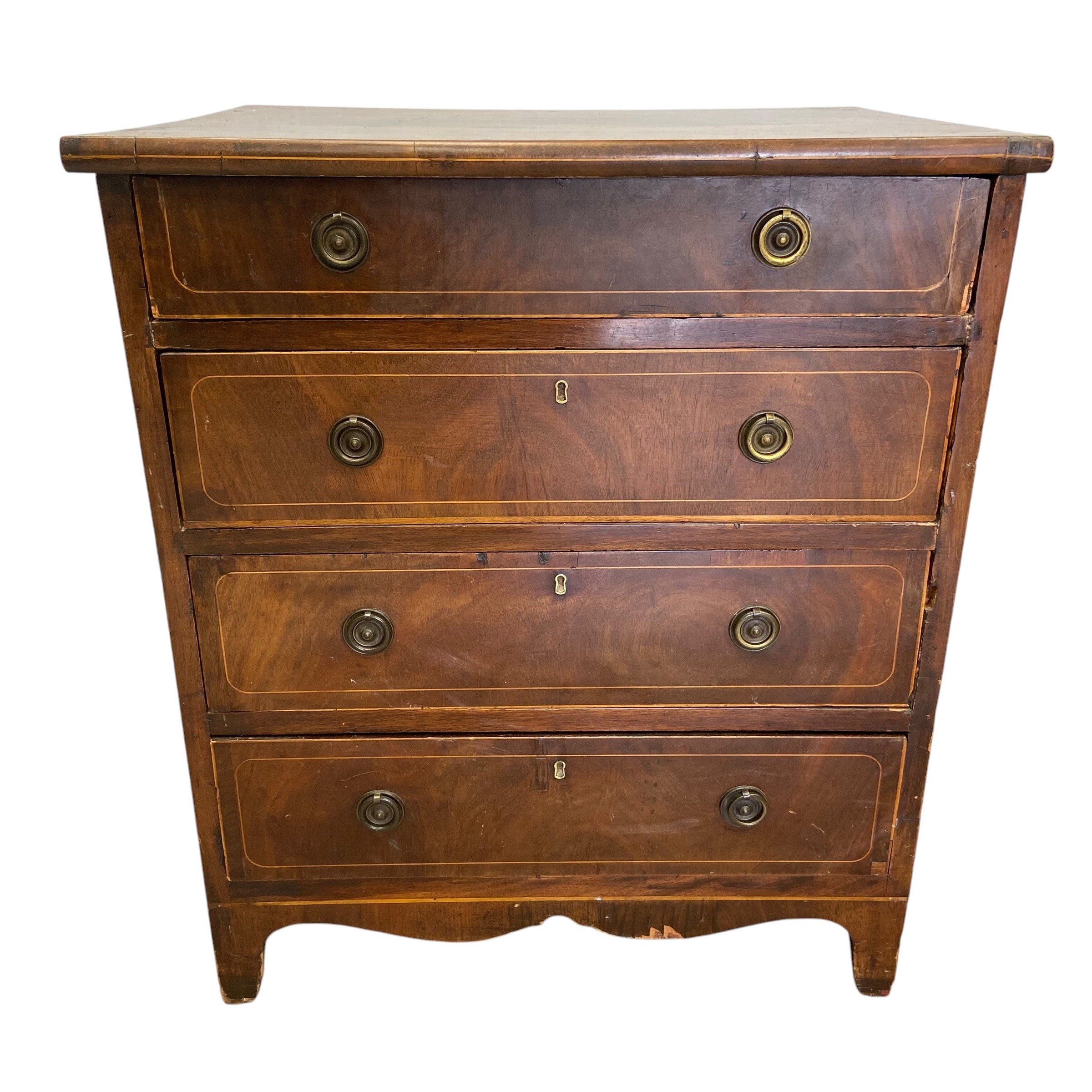 A 19th century mahogany chest of four long satinwood inlaid drawers over the shaped apron raised