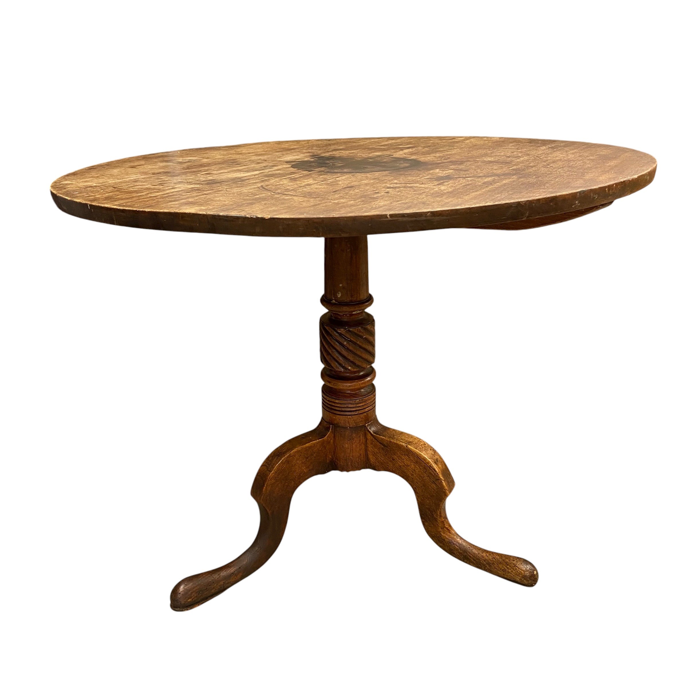 A 19th century mahogany occasional table with circular tilt-top over the carved pedestal raised on