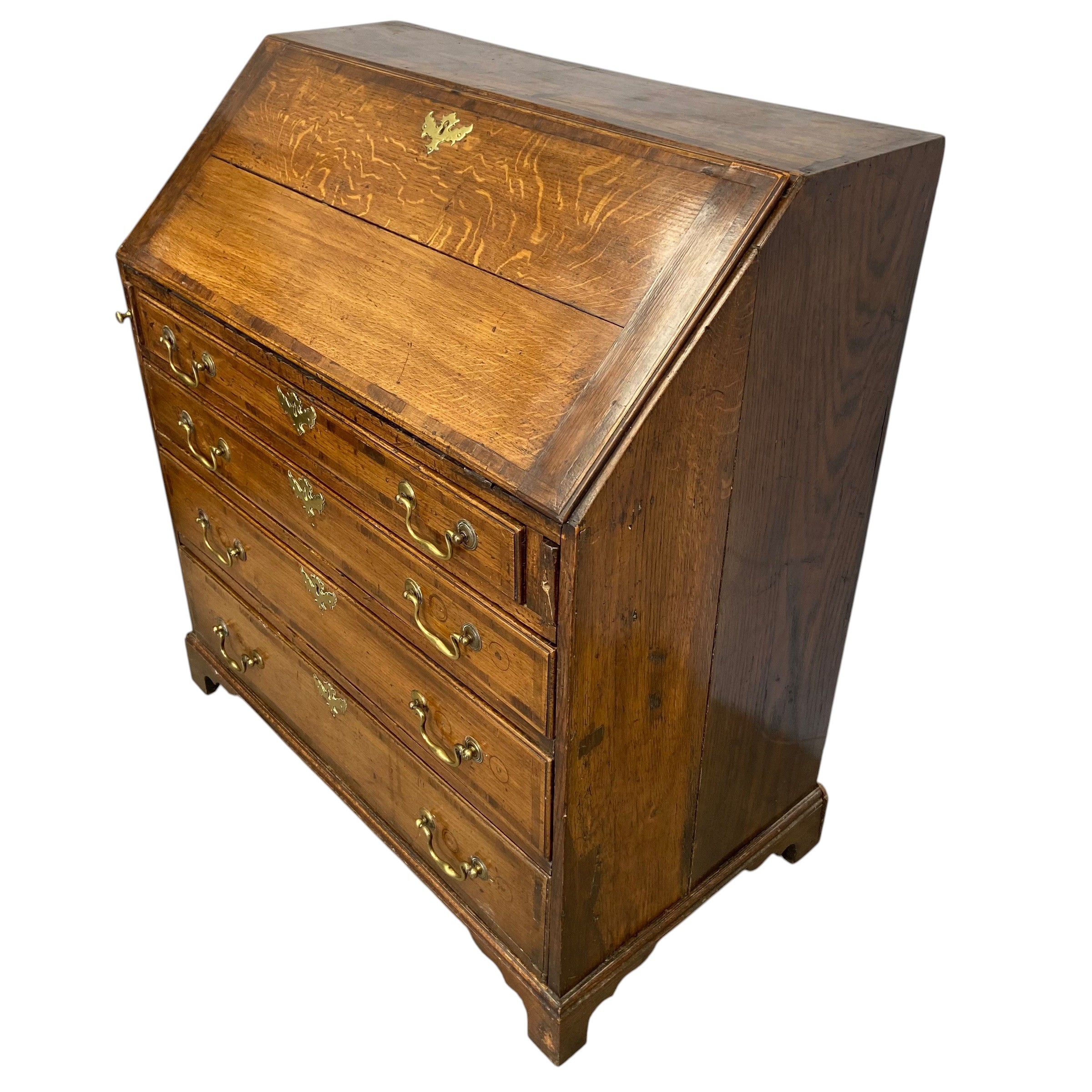 A Georgian oak bureau with fall front enclosing fitted interior over four long graduating drawers - Image 4 of 6