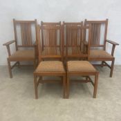 A set of six Arts & Crafts style 'Mission' cherrywood dining chairs each with with straight stick