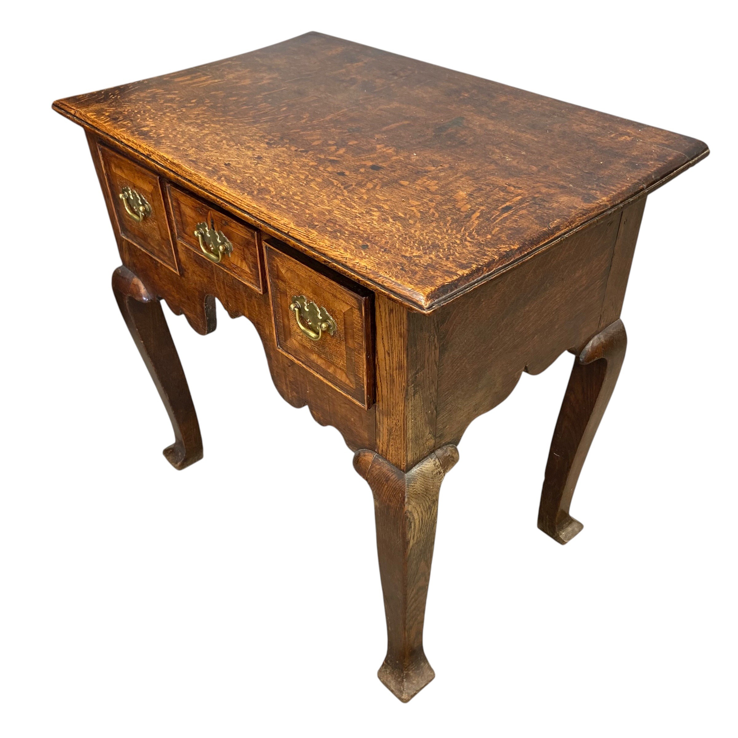 A Georgian oak lowboy with plank top over three frieze drawers raised on square section cabriole - Image 4 of 4
