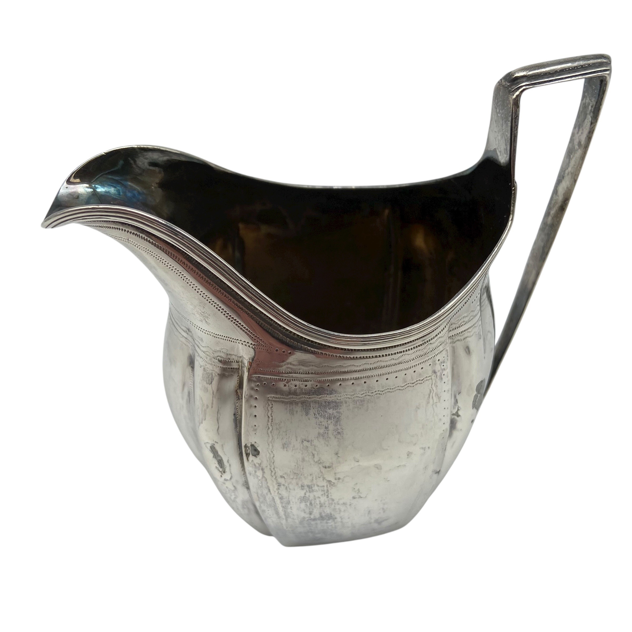 An Arts & Crafts hammered sterling silver creamer by Birmingham Guild of Handicraft Ltd, 1903 - Image 8 of 10