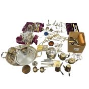 A mixed collection of silver plated and other items to include trays, bowls, teapots, cutlery and
