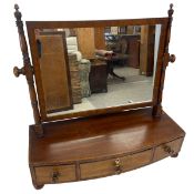 A 19th century mahogany toilet swing mirror with square plate in a crossbanded frame over three