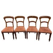 A set of four 19th century mahogany balloon-back dining chairs with pink velour upholstered