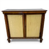 A Regency rosewood chiffonier side cabinet having a figured top with beaded edge over the pleated