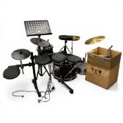 A vintage Ion Pro Session electric drum kit together with an acoustic Session Pro Fusion drum kit